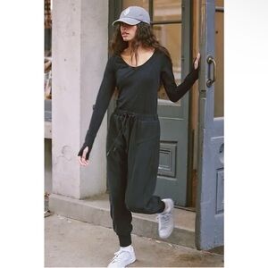 FP Movement by Free People Black fleece  romper sz small